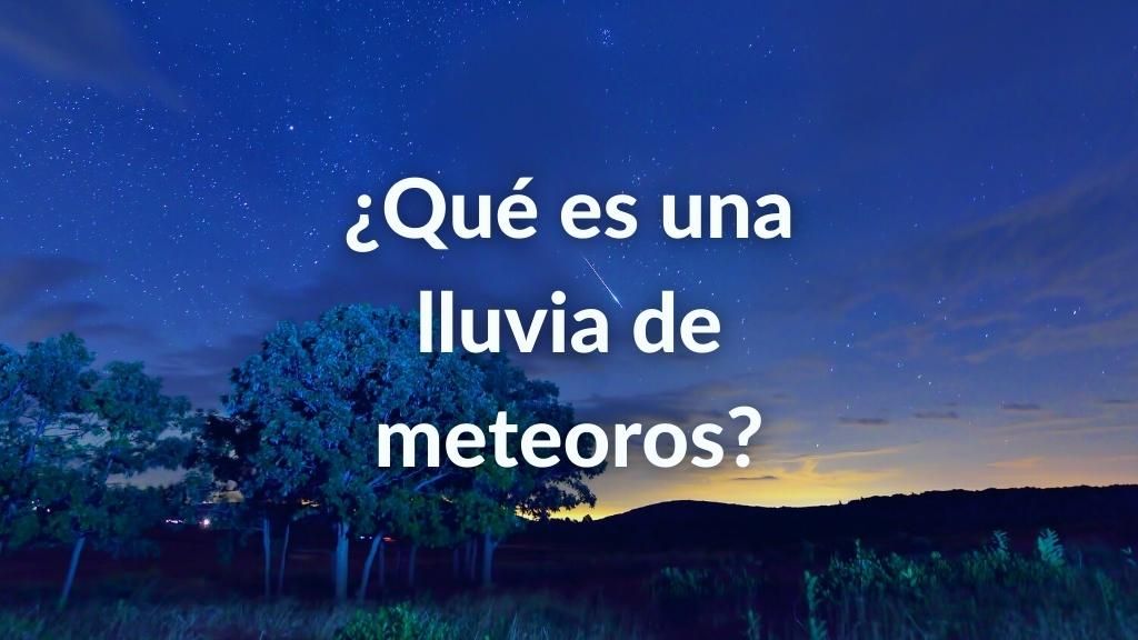 Foto del cielo al anochecer donde se ve una estrella fugaz. Contiene el texto sobre escrito: ¿Qué es una lluvia de meteoros?